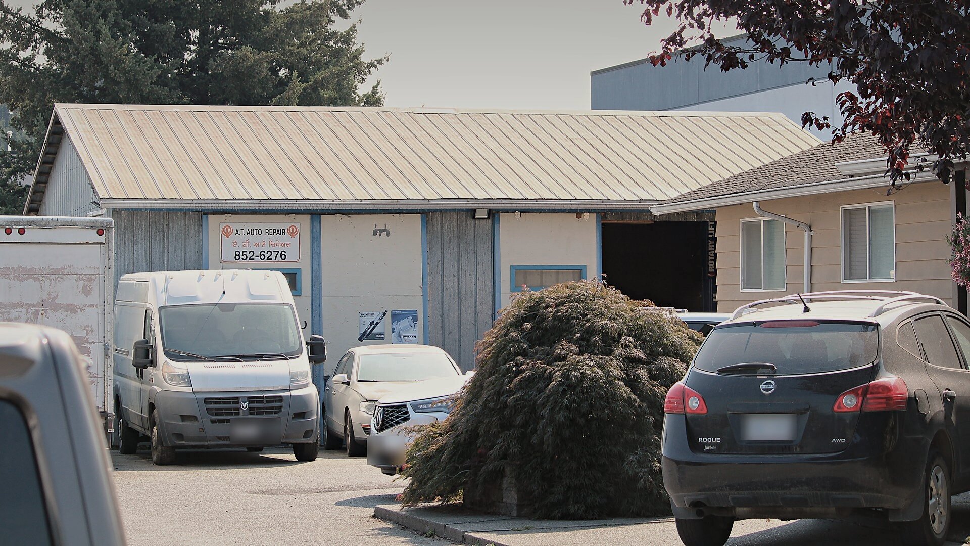 Pulling in at A-T Auto Repair — the working shop and front office on Townline Road.